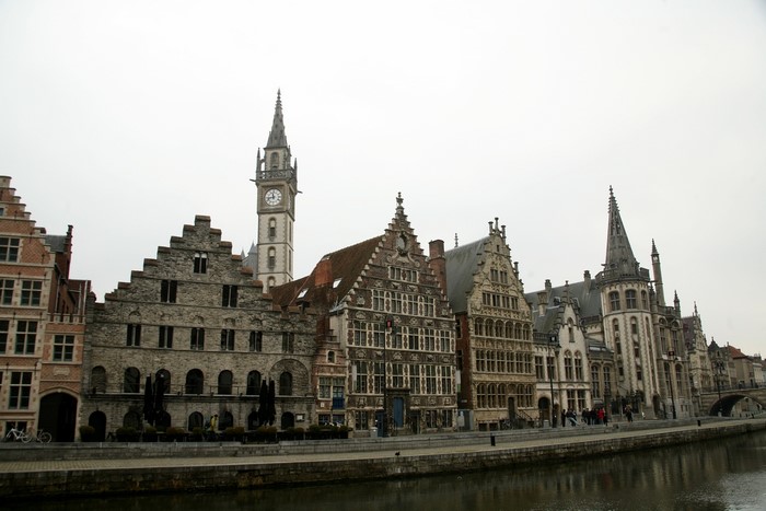 Historic buildings along a canal in Belgium
