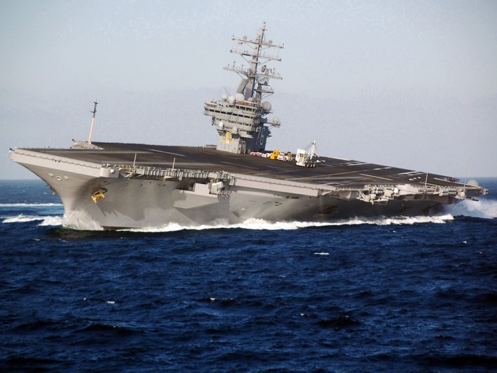 Aircraft carrier sailing on the ocean
