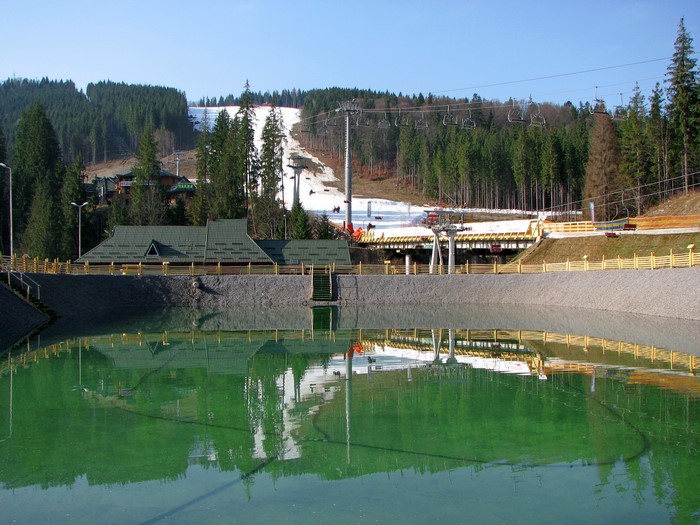 Ski resort with ski lift and water reservoir