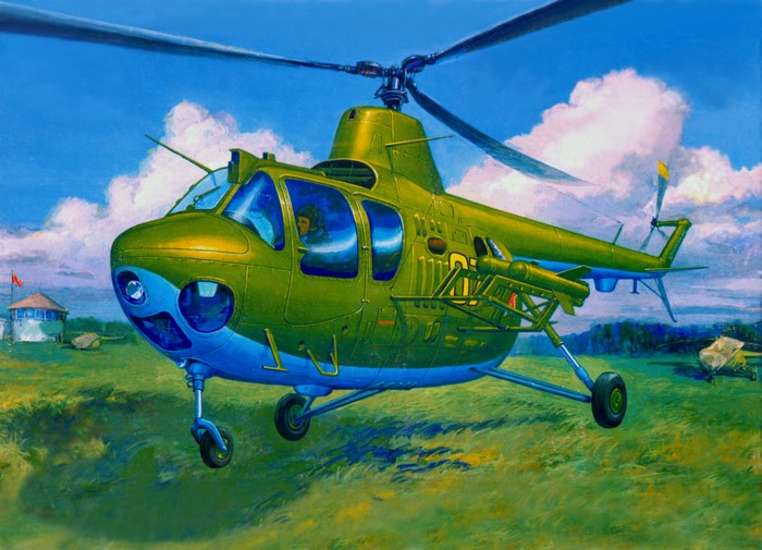 Helicopter in a field with a building