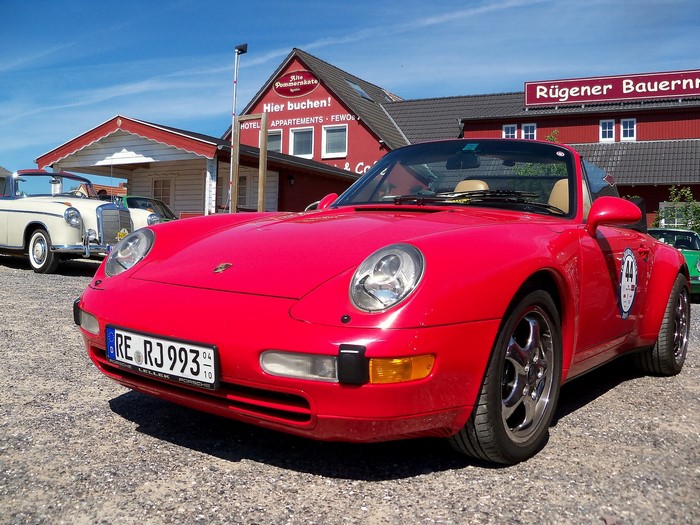 Red Porsche 911 Convertible with Vintage Cars