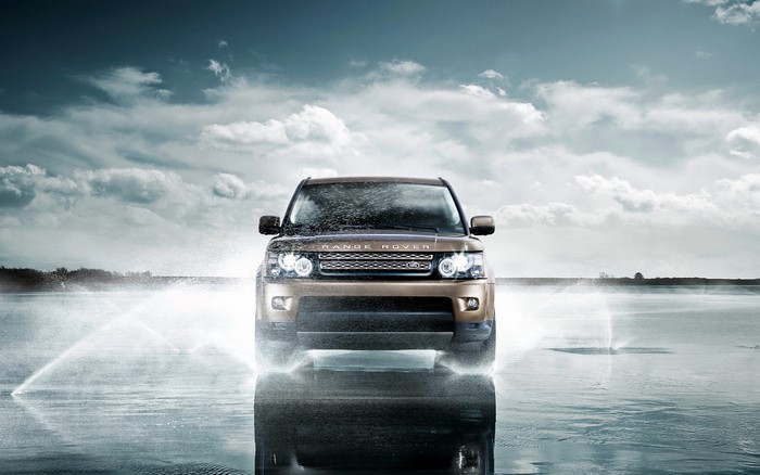 Range Rover driving through water