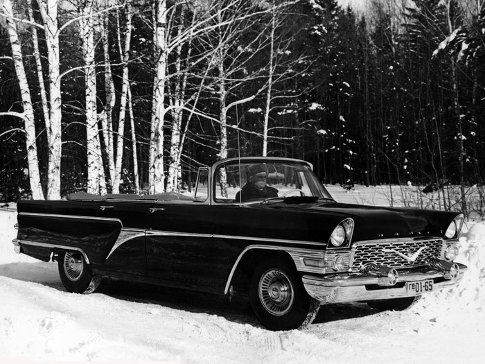 Convertible GAZ-13 Chaika in winter forest