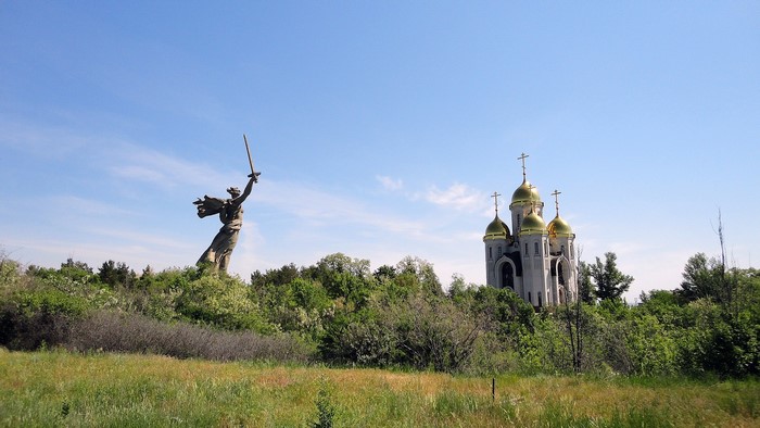 The Motherland Calls monument and Church of All Saints in Volgograd