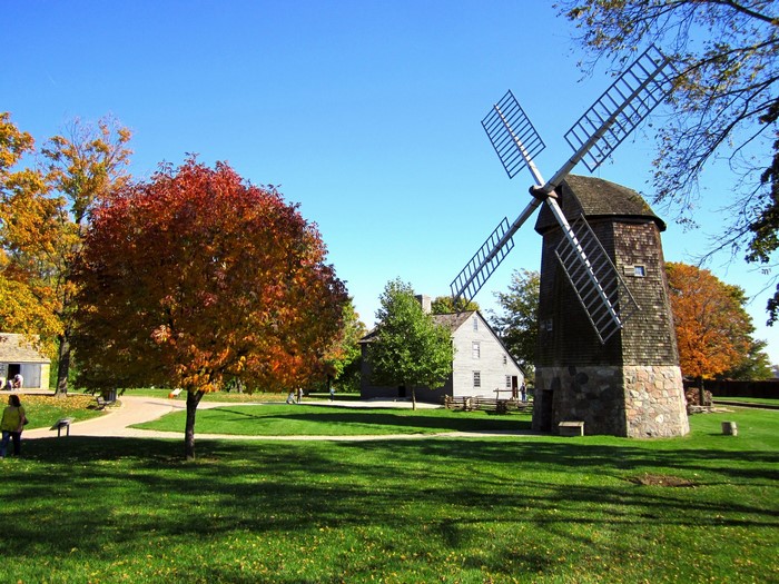 Windmill and historic buildings in Michigan