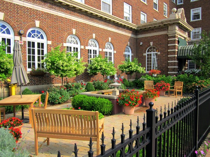 Courtyard with brick building and garden