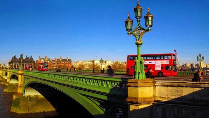 Westminster Bridge London with red buses