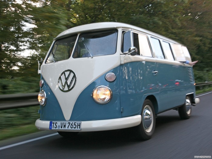 Blue and white Volkswagen T1 Sumba Bus driving on road