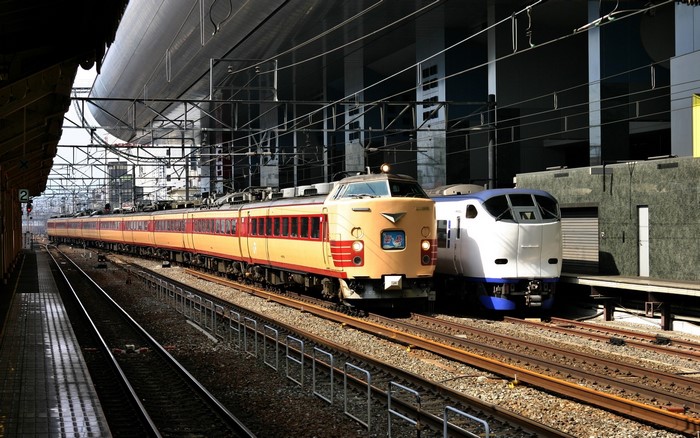 Two trains at a station platform
