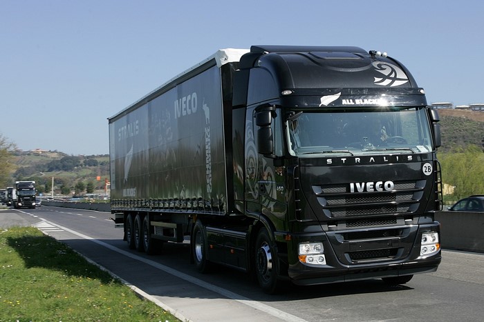 Black Iveco Stralis All Blacks Truck on Highway