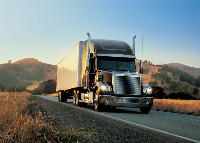 Freightliner Semi-Truck Driving on a Rural Road