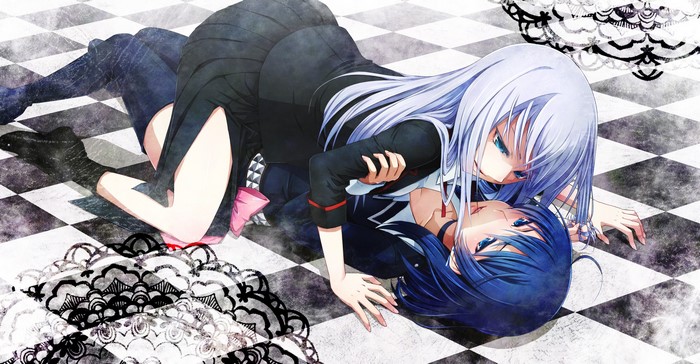 Two girls in a wrestling match on a checkered floor