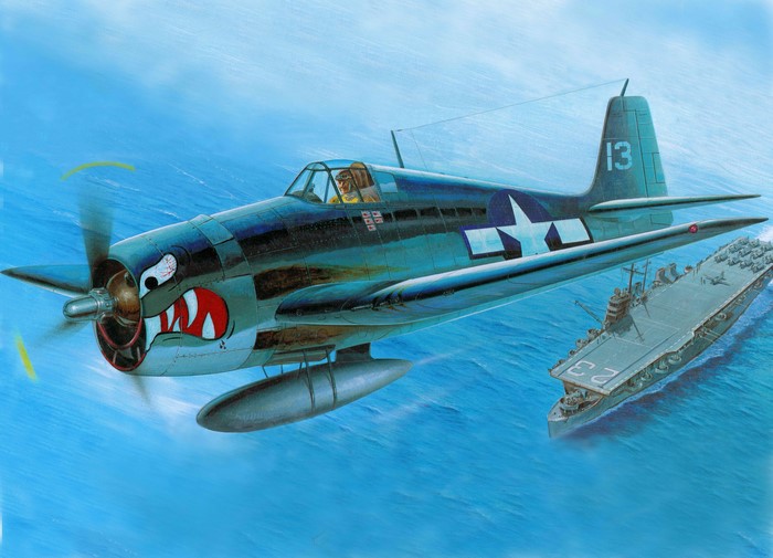 Grumman F6F Hellcat fighter plane over aircraft carrier
