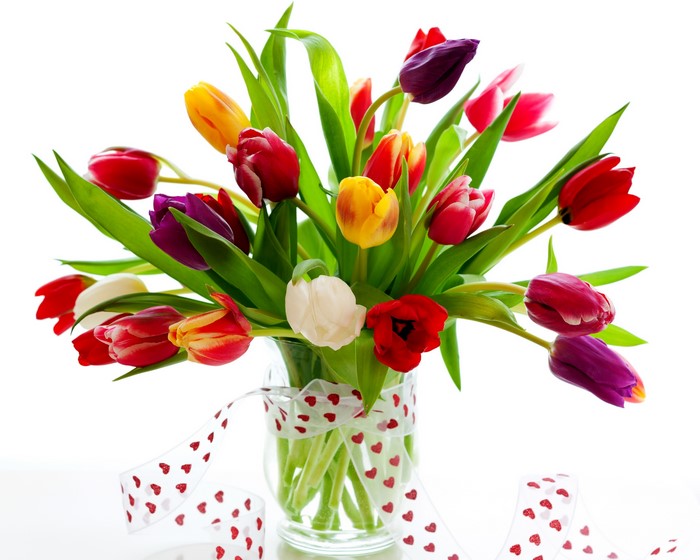 A colorful bouquet of tulips in a vase