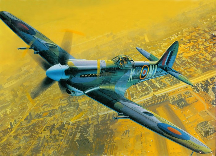 Supermarine Spitfire airplane flying over city