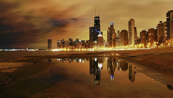 Chicago city skyline at night with reflections