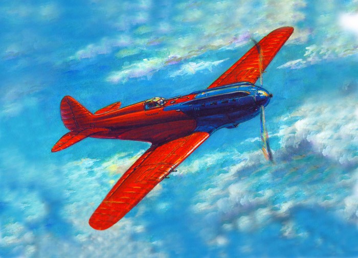 Red and blue airplane flying in the sky