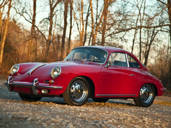 Red Porsche 356 Coupe parked outdoors