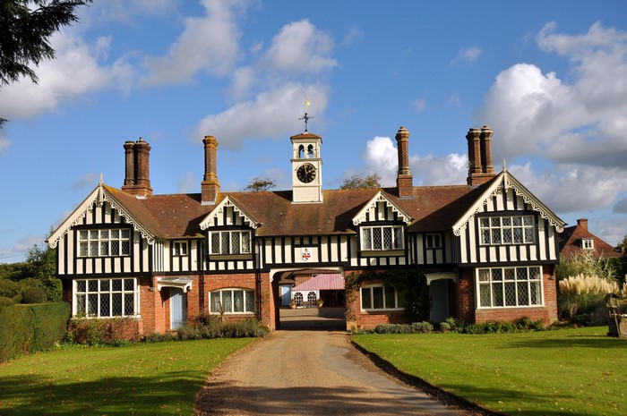 Tudor-style house with clock tower in the United Kingdom