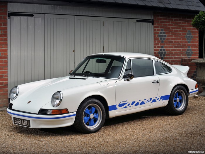 White Porsche 911 Carrera with blue accents