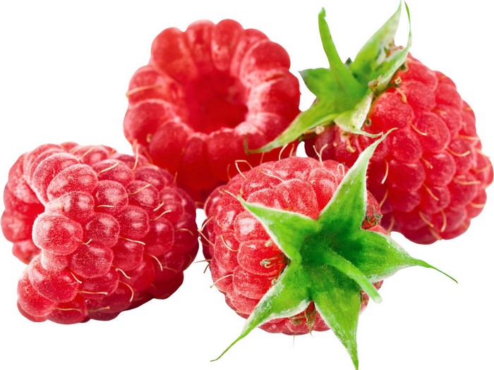 Four ripe raspberries with green leaves