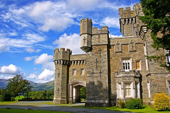 Wray Castle with Mountains and Blue Sky