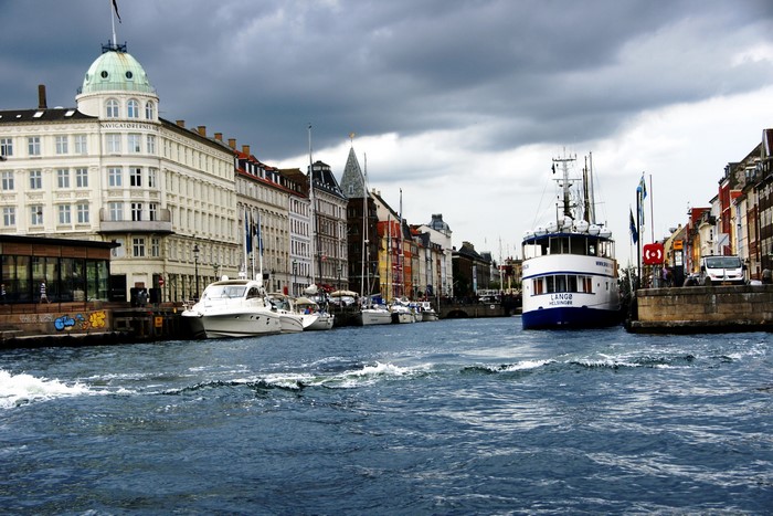 Canal in Copenhagen, Denmark with boats and buildings