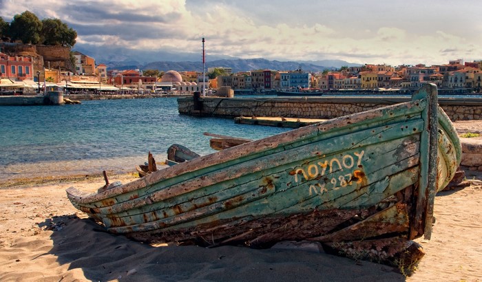 Old boat on the beach in Chania, Crete, Greece