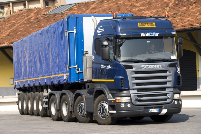Blue Scania R560 truck with blue trailer