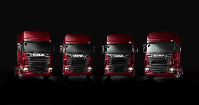 Four Red Scania Trucks