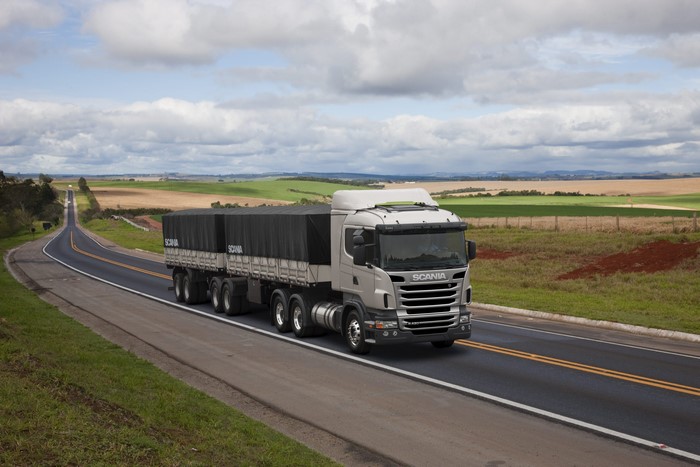 Scania truck driving on a rural road