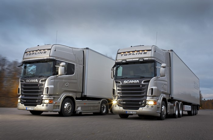 Two Scania Topline trucks on a road