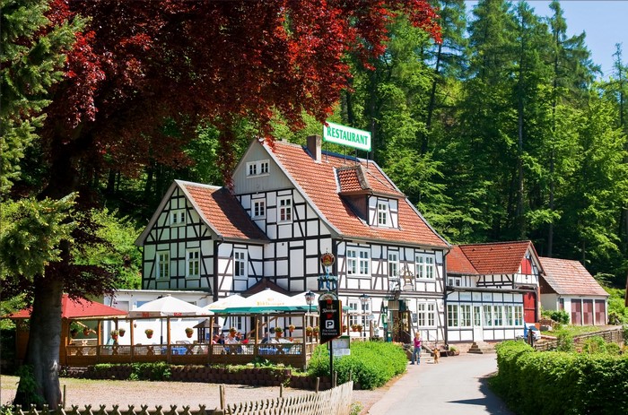 Half-timbered restaurant building in a forest in Germany