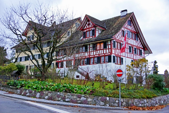 Traditional Swiss houses with red and white timber framing