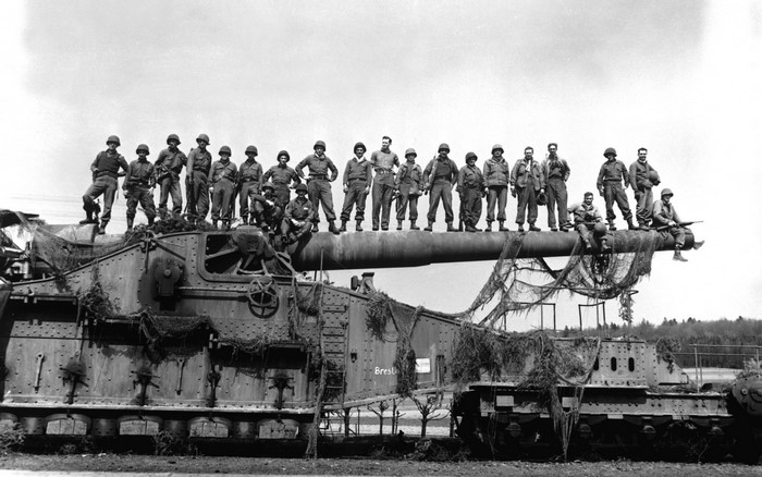 Soldiers on a large cannon