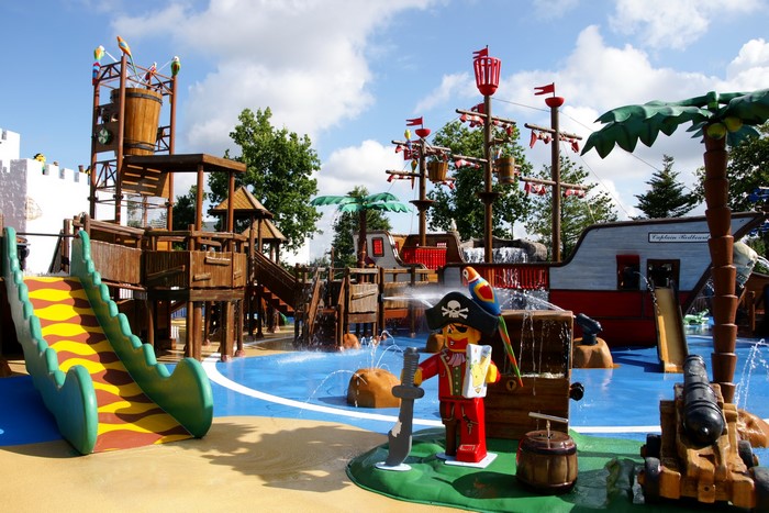 Pirate-themed water park with slides and a ship