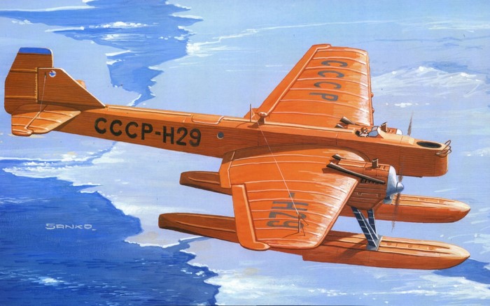 Orange seaplane with CCCP-H29 markings flying over water