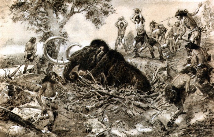 Cavemen hunting a mammoth