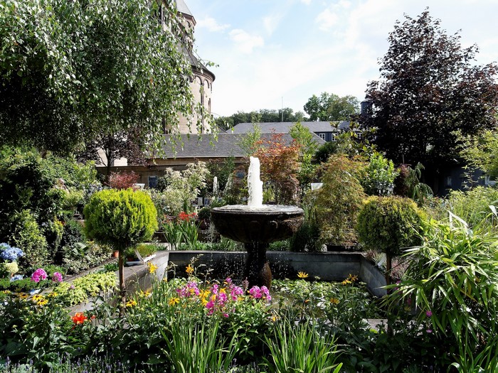 Garden with fountain and flowers