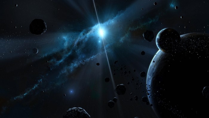 Asteroids and planets in deep space with bright nebula