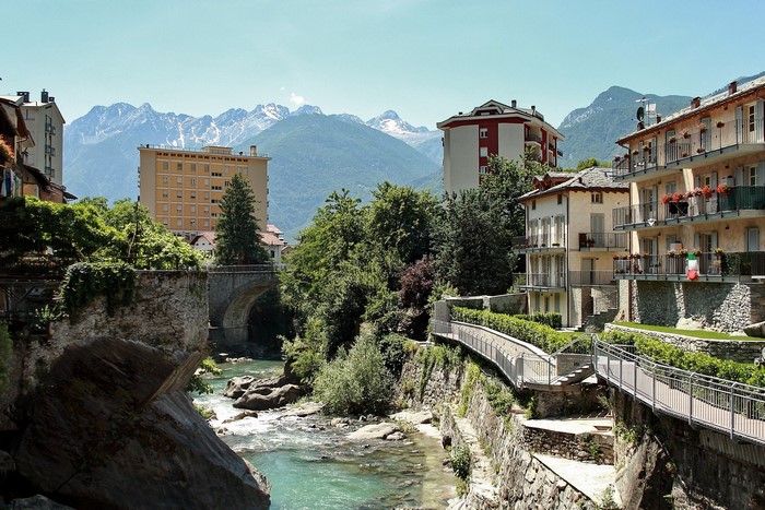Town with river and mountains in Italy