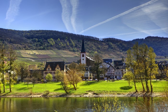 Village with church and vineyards in Germany