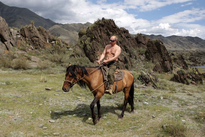 Vladimir Putin Riding Horse in Mountain Landscape