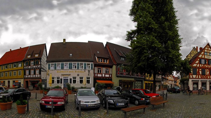 Street in Germany with Half-Timbered Houses and Cars