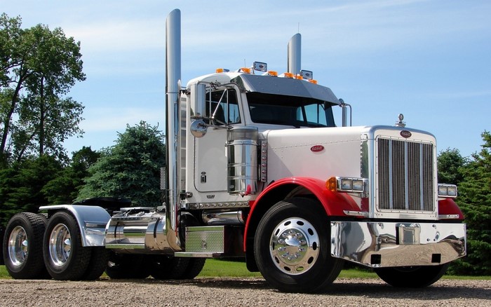 Peterbilt semi-truck with chrome stacks