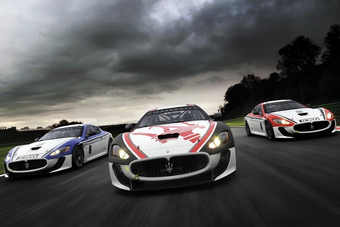 Maserati race cars on a track