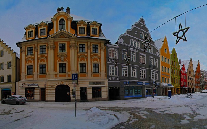 Colorful buildings in a snowy German town square