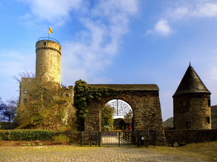 Burg Pyrmont castle gate and towers under blue sky