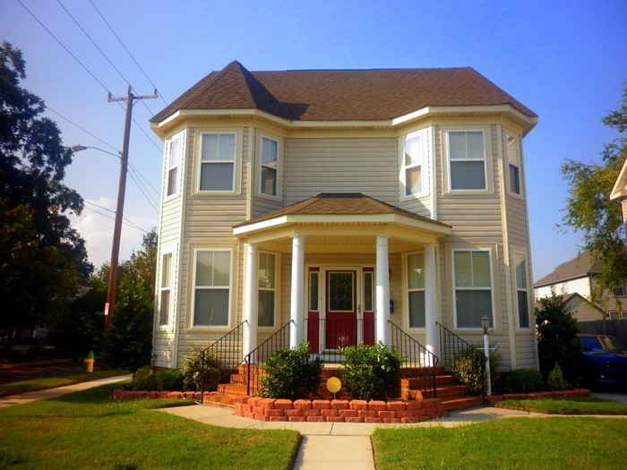 Two-story house with bay windows in Norfolk, Virginia