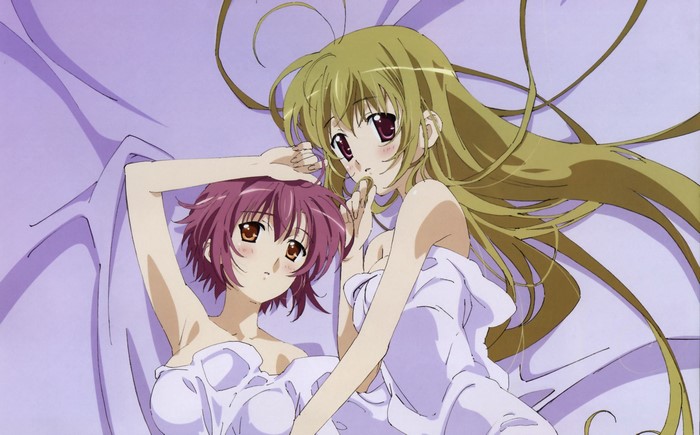 Two girls in towels lying down